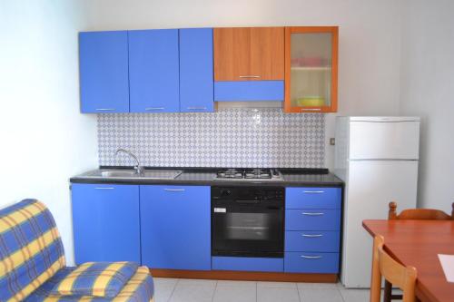 Η κουζίνα ή μικρή κουζίνα στο Villaggio Calispera