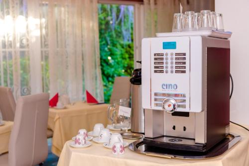 a coffee machine sitting on top of a table at 1a Hotel Steiner in Judenburg