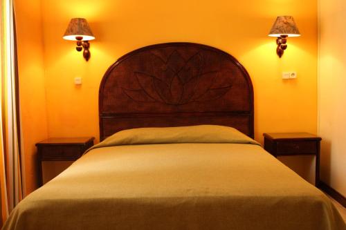 Postel nebo postele na pokoji v ubytování Hotel Ventura