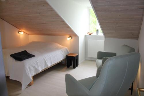 Säng eller sängar i ett rum på Skovlide Beautiful Farmhouse