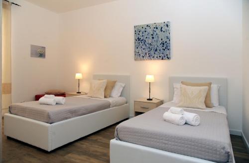 Postel nebo postele na pokoji v ubytování Alkira Lodge
