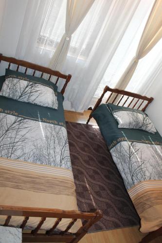 Кровать или кровати в номере Guest House Ohrid Trpeski