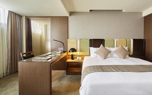 Ένα ή περισσότερα κρεβάτια σε δωμάτιο στο Hotel Sukimi