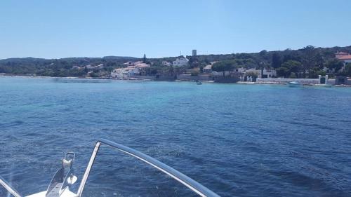 a boat on a body of water at B&B Quintino Sella in Iglesias