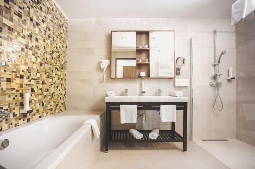 Koupelna v ubytování Caramell Premium Resort Superior