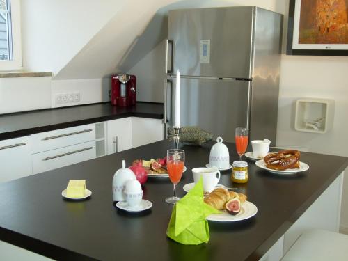 Η κουζίνα ή μικρή κουζίνα στο LakeStarnberg Apartments