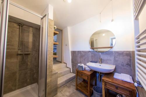 a bathroom with a sink and a shower at i Trulli di Figazzano in Locorotondo