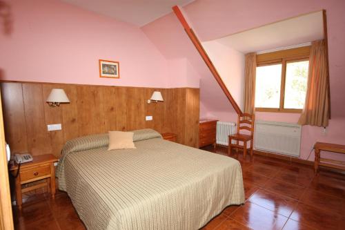 Postel nebo postele na pokoji v ubytování Hotel Rural Montaña de Cazorla