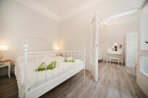 Кровать или кровати в номере Öreg Malom Apartmanház