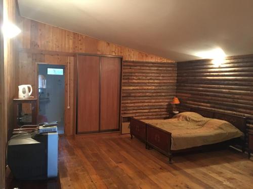 Voodi või voodid majutusasutuse Cottages on Gosdacha toas