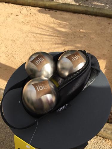 a pair of headphones sitting on top of a table at ibis Marseille Centre Gare Saint Charles in Marseille