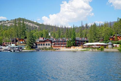 a resort on the shore of a body of water at The Pines Resort & Conference Center in Bass Lake