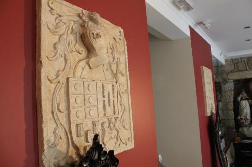 a painting on a wall in a room at Casa Museu in Vouzela