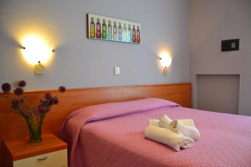 Postel nebo postele na pokoji v ubytování Hotel My Fair