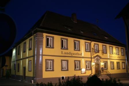 a large yellow building with the words lancasterhospital at Goldener Adler in Sulzheim