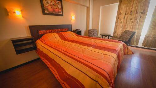 Katil atau katil-katil dalam bilik di Hotel Koricancha
