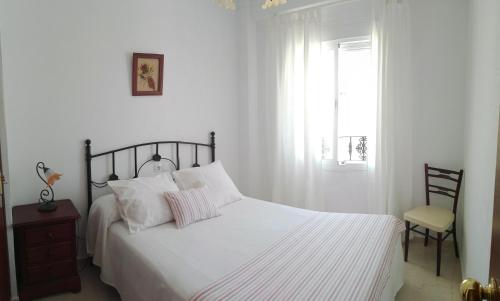 Postel nebo postele na pokoji v ubytování El Mirador de Vejer