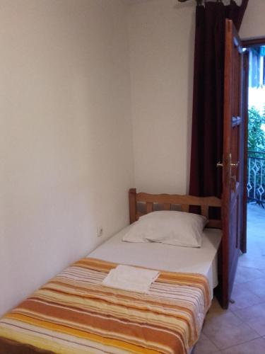 Cama o camas de una habitación en Apartmani Ivana