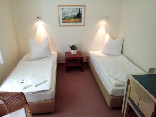 Llit o llits en una habitació de Pension am Krossinsee