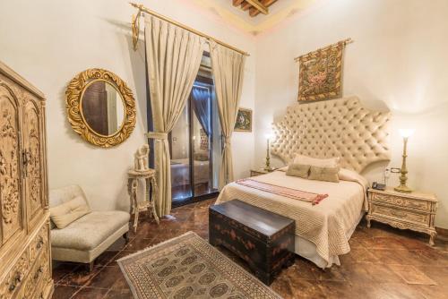 Postel nebo postele na pokoji v ubytování Casa Pedro Loza