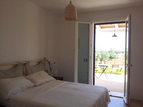 Llit o llits en una habitació de B&B Sosta A Ponente