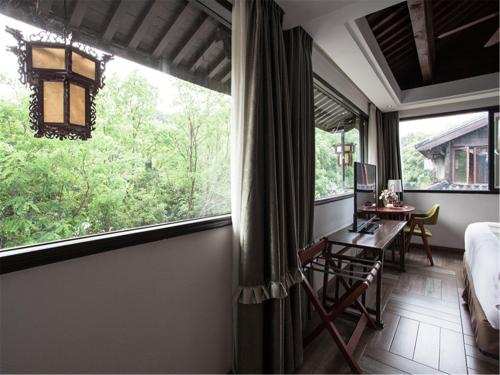 Afbeelding uit fotogalerij van Yurong West Lake Cottage Resort Hotel Hangzhou in Hangzhou