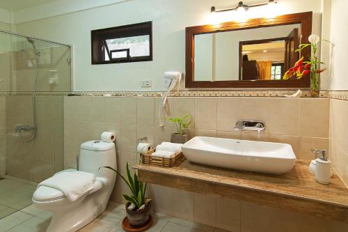 Ванная комната в Oasis Resort