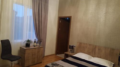 Postel nebo postele na pokoji v ubytování Guest House Elene