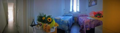 Ein Bett oder Betten in einem Zimmer der Unterkunft I Lecci Di Soviore