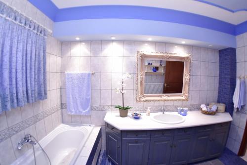 Ένα μπάνιο στο Palio Suites