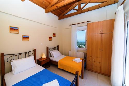 Katil atau katil-katil dalam bilik di Alkistis Villa