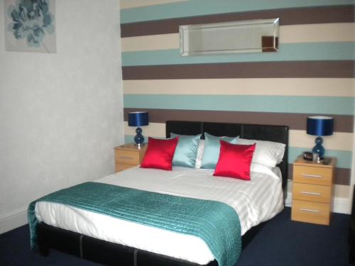 Ένα ή περισσότερα κρεβάτια σε δωμάτιο στο Glenavon Guest House