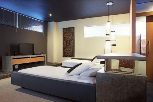Ένα ή περισσότερα κρεβάτια σε δωμάτιο στο Clio Apartment