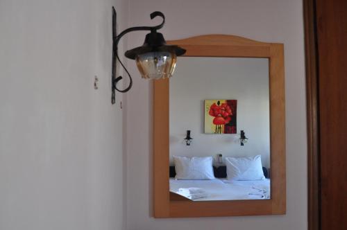 Postel nebo postele na pokoji v ubytování Byzance Hotel