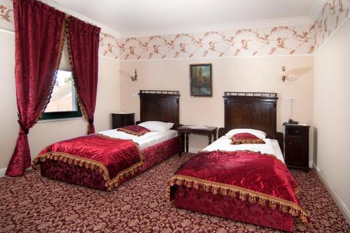 A bed or beds in a room at Hotel Boutique Casa del Sole