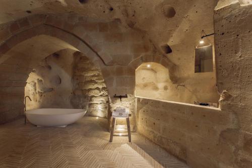 Vannas istaba naktsmītnē Palazzotto Residence&Winery
