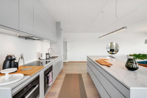 Dapur atau dapur kecil di Wright Apartments - Sørenga