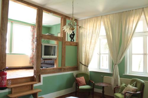 Μια τηλεόραση ή/και κέντρο ψυχαγωγίας στο Gästehaus Tobringen 20