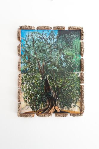 a framed picture of a tree with a rabbit at il Giardino delle Zie in Tricase