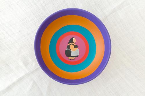 a colorful frisbee with a picture of a woman on it at il Giardino delle Zie in Tricase