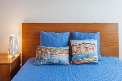 Apartment Camõesにあるベッド