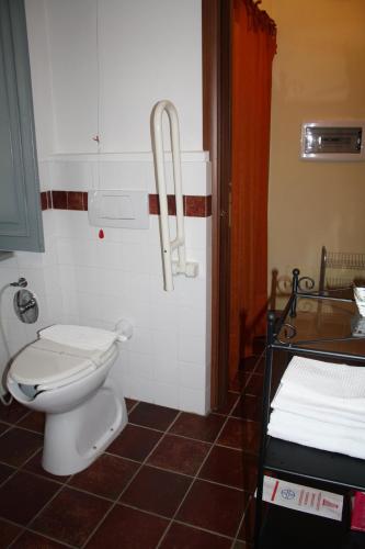 a bathroom with a toilet and a sink at Cà Veja in Montà