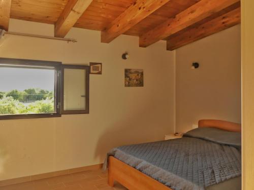 Postel nebo postele na pokoji v ubytování Gelsomino B&B