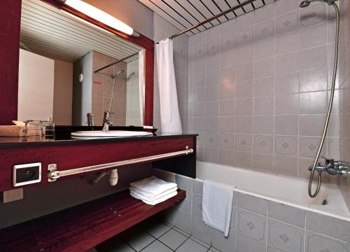 A bathroom at Le Stanley Hôtel