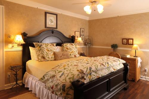 a bedroom with a large bed in a room at Lilac Inn in Brandon
