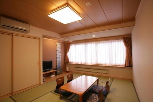 五箇山荘にあるテレビまたはエンターテインメントセンター