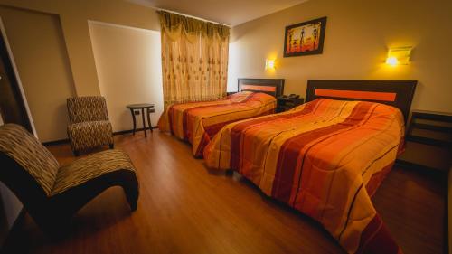 Katil atau katil-katil dalam bilik di Hotel Koricancha