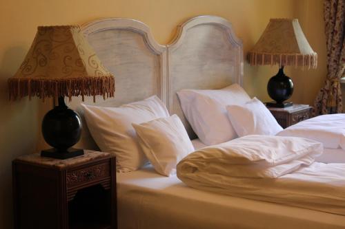 Кровать или кровати в номере Cracow Apartments 24