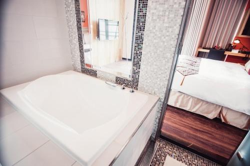 Cama o camas de una habitación en Dreamer Boutique Hotel