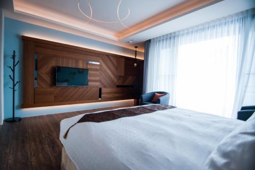 Cama o camas de una habitación en Dreamer Boutique Hotel